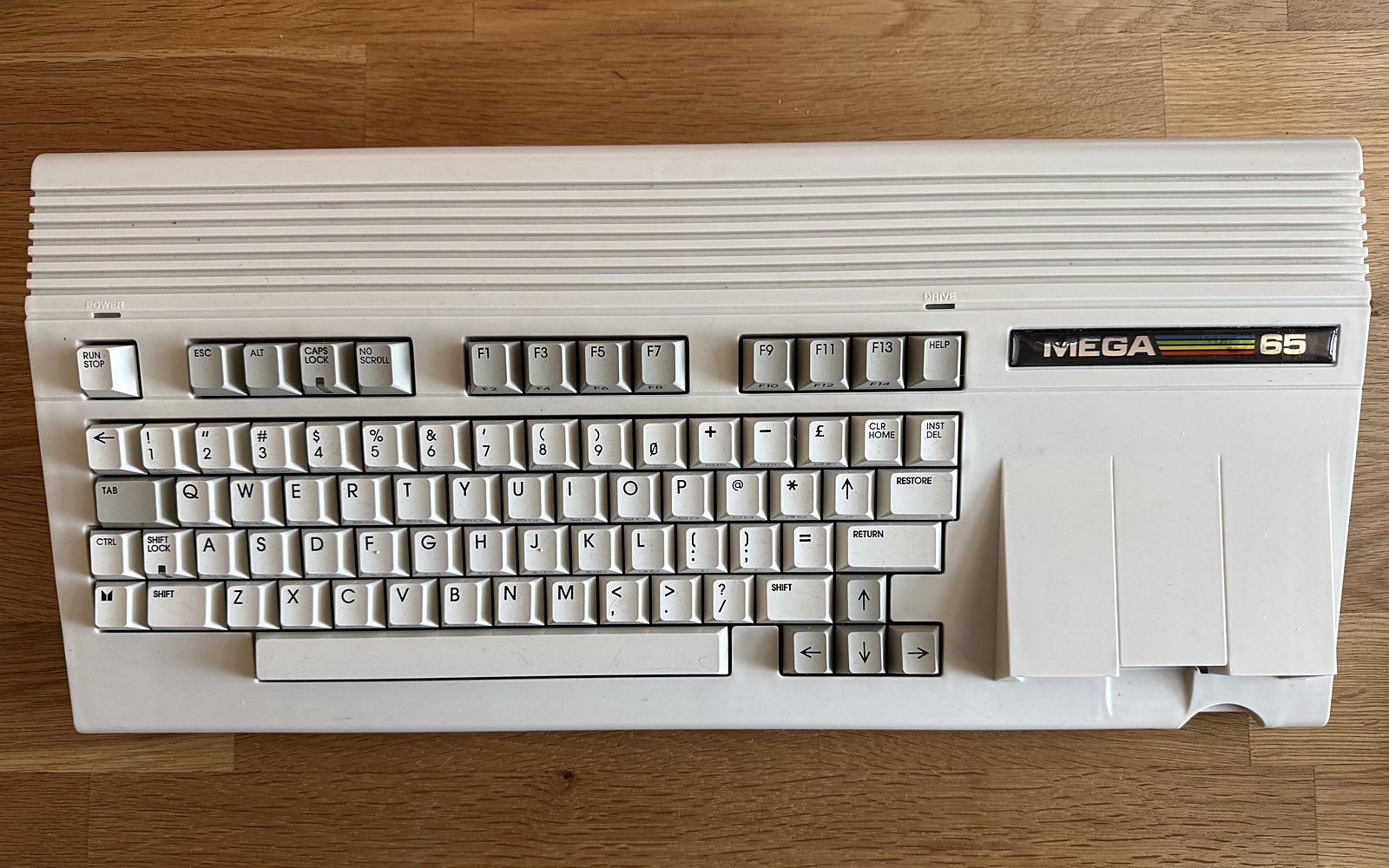 The MEGA65 in its C65-style case