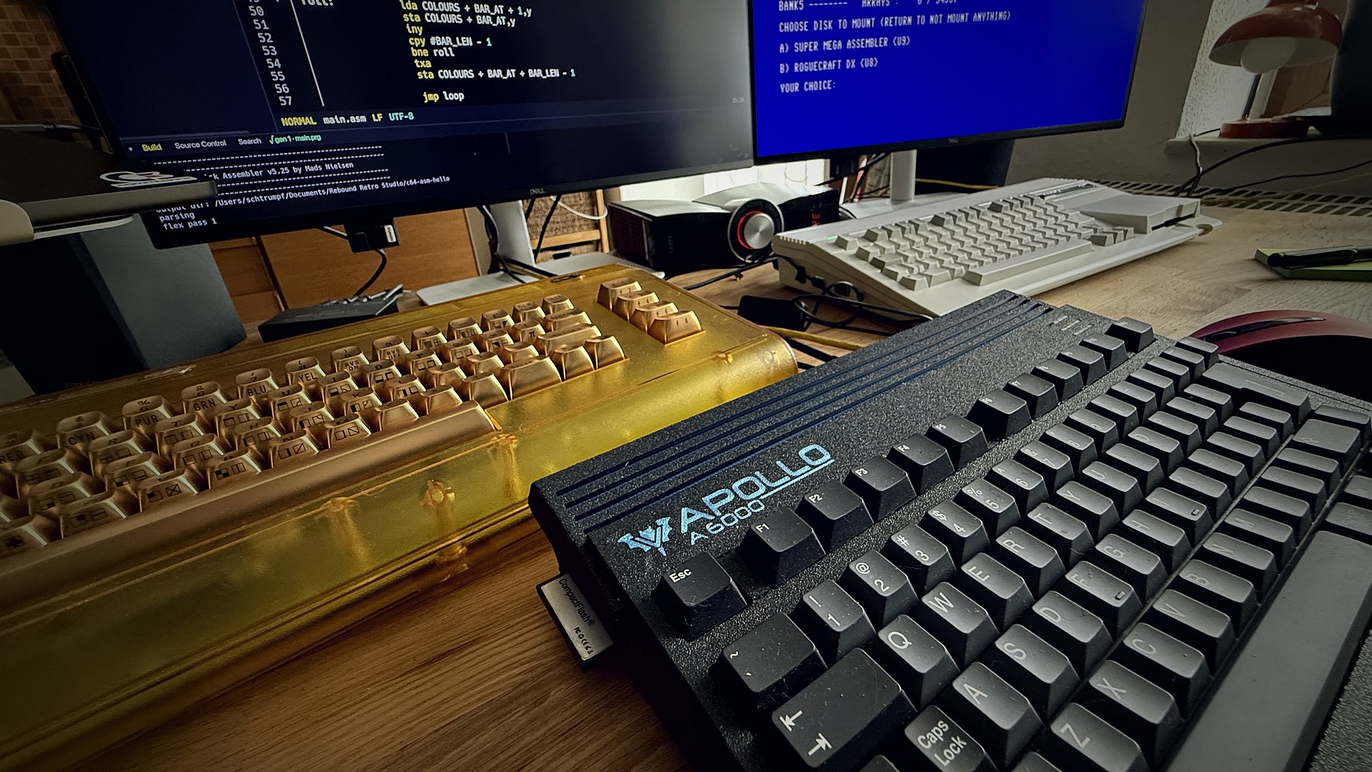 My desk: the C64 Ultimate and the Apollo A6000 in front of the screens